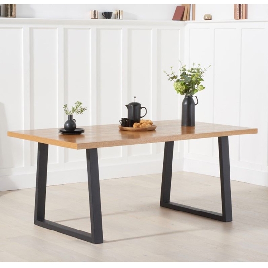 Una Rectangular Wooden Dining Table In Oak With Black Legs